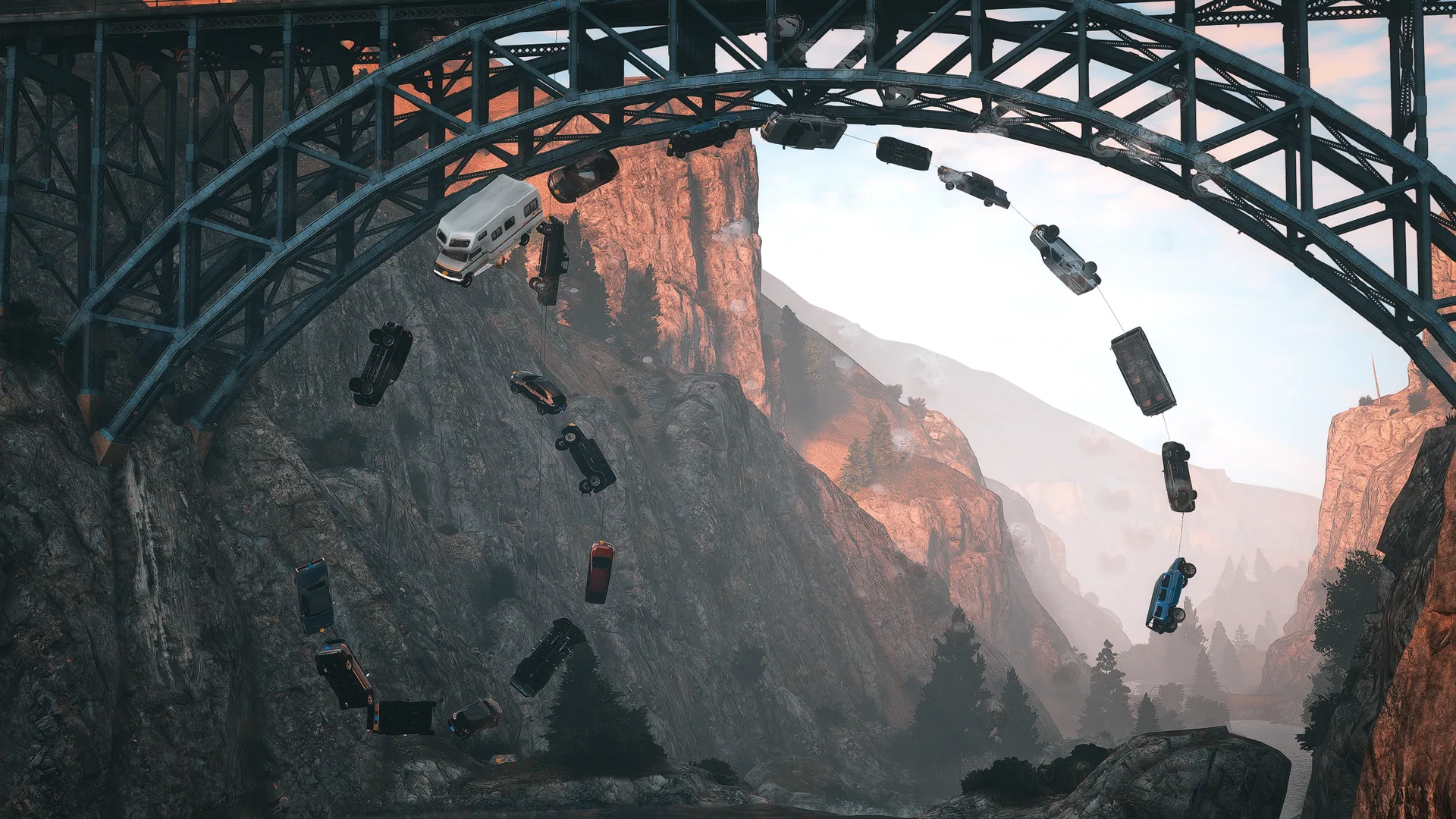 A large ring of vehicles held by live tethers beneath a bridge