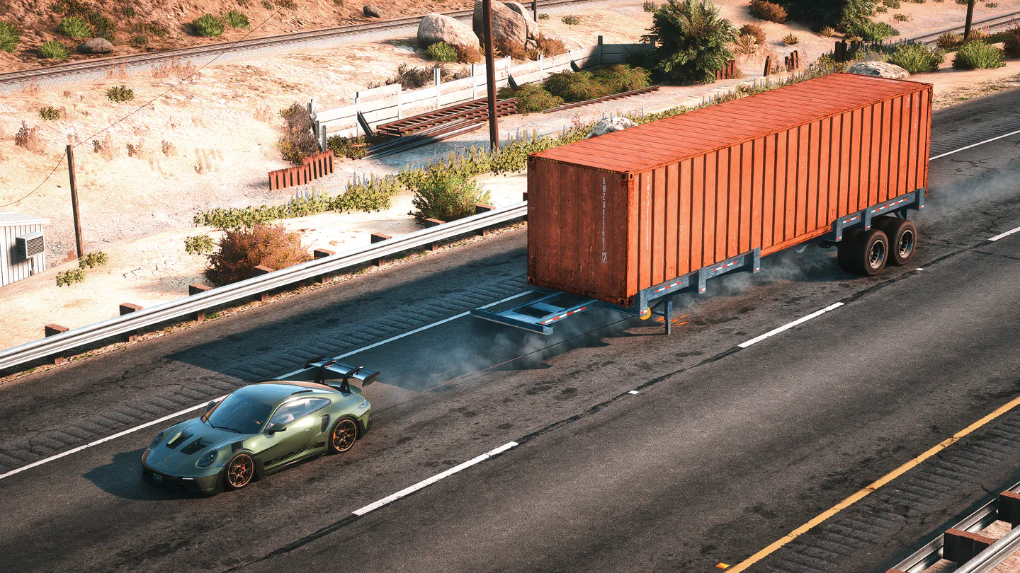 A sports car transferring the load of a heavy container through a live tether